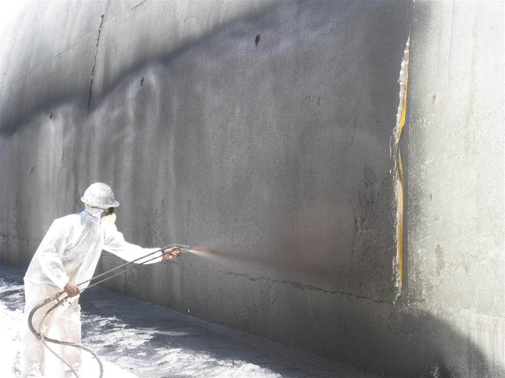 https://ibharatpmc.com/wp-content/uploads/2023/07/Applying_waterproofing_material_to_the_outside_of_a_tunnel.jpg